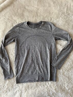 grey lululemon swiftly tech long sleeve top with banded bottom